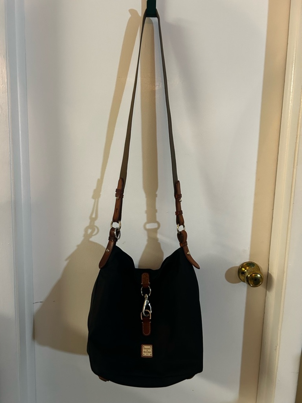 Dooney & Bourke Black Shoulder Bag with Brown Leather Trim and Silver Hardware